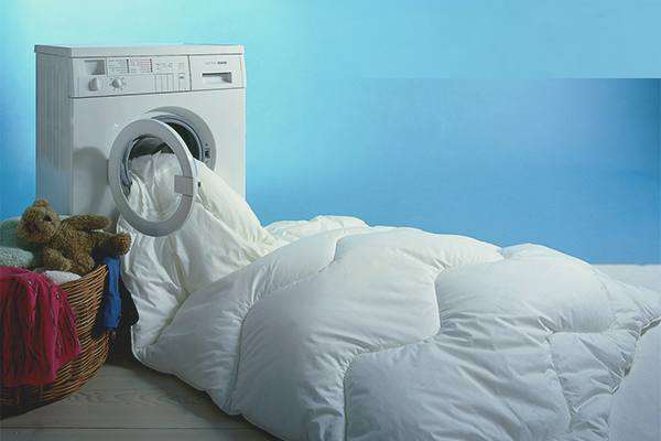 Прання ковдри з вовни: як прати в пральній машині і вручну, при якій температурі