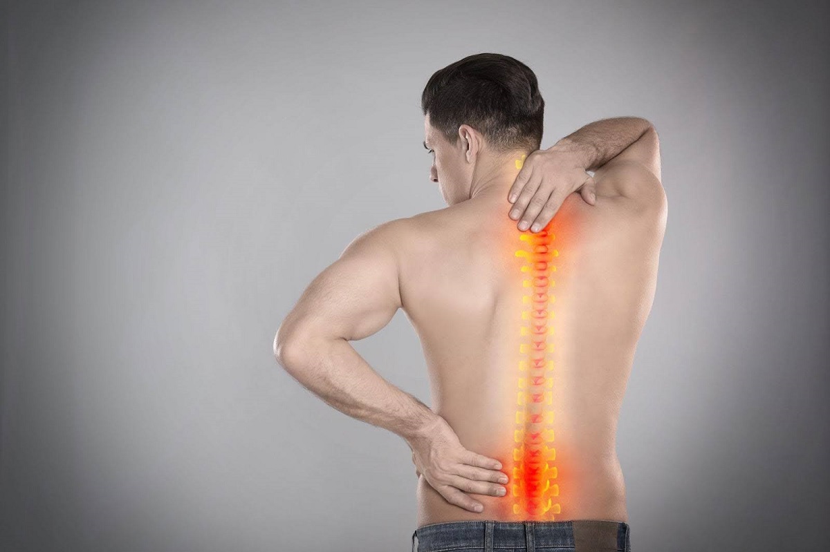 Чому виникає біль у спині?